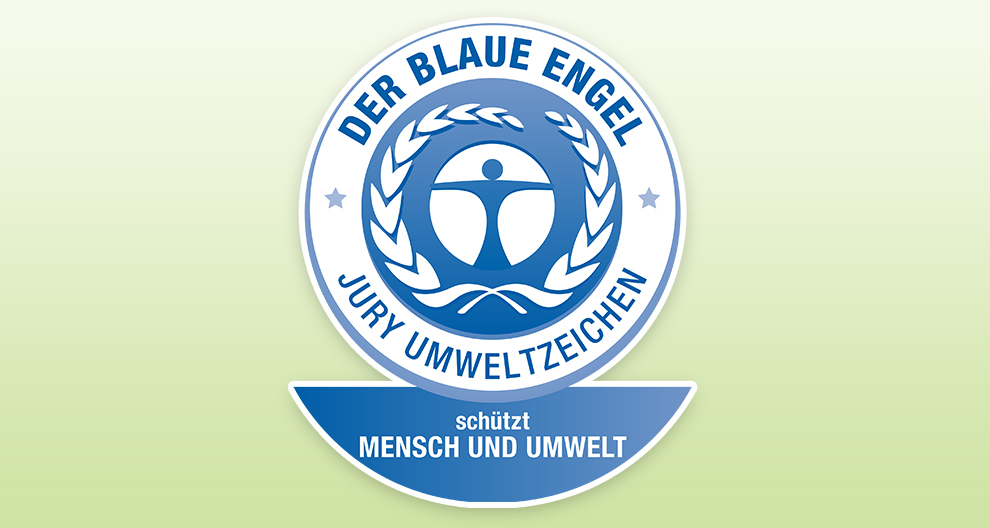 A blue and white emblem with a human silhouette in the center, surrounded by a laurel wreath, with the text "DER BLAUE ENGEL" at the top, "JURY UMWELTZEICHEN" at the bottom, and "schutzt MENSCH UND UMWELT" at the bottom right.